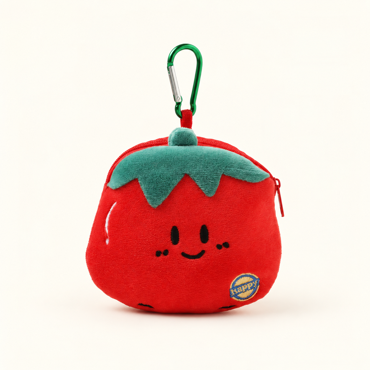 tomato smile plush coin purse with green clip on ivory background