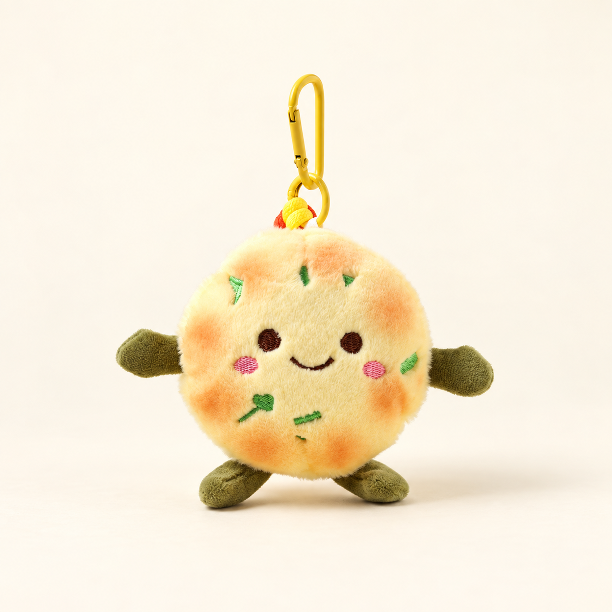pancake plush bag charm on ivory background