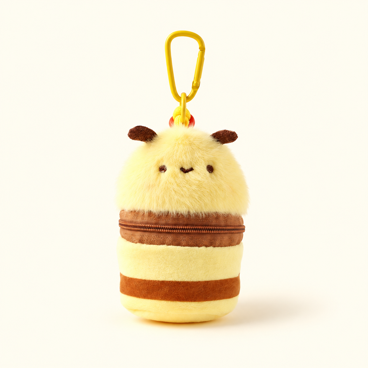 bee bucket plush coin purse charm on ivory background