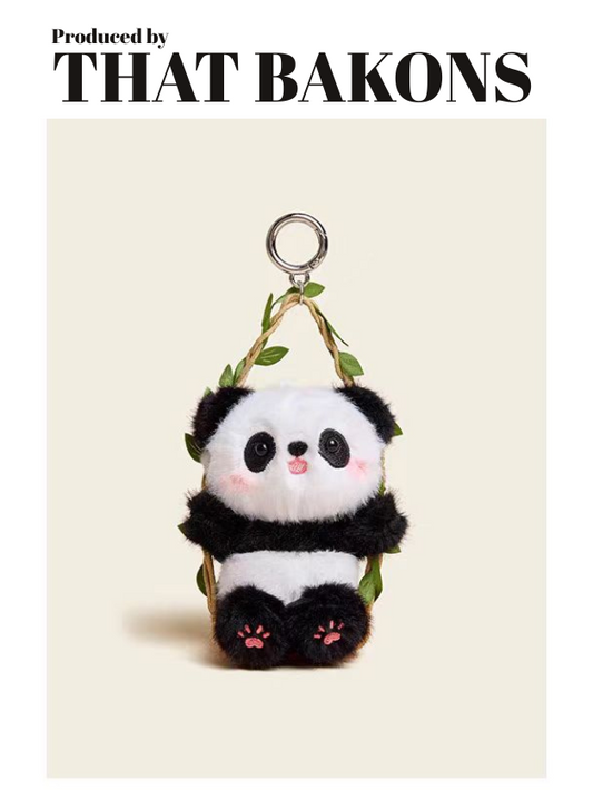 Плюшена гривна с панда в зелени комбинезони