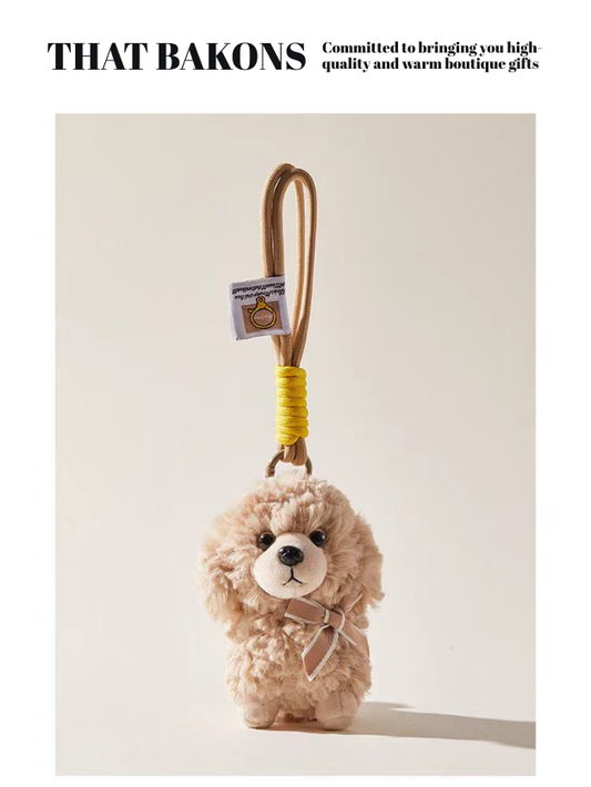 Пухкав плюшено кученце като украса за чанта