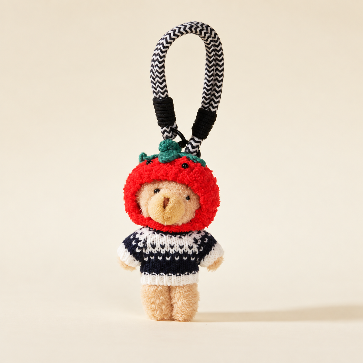 black hooded sweater bear with rope loop on ivory background
