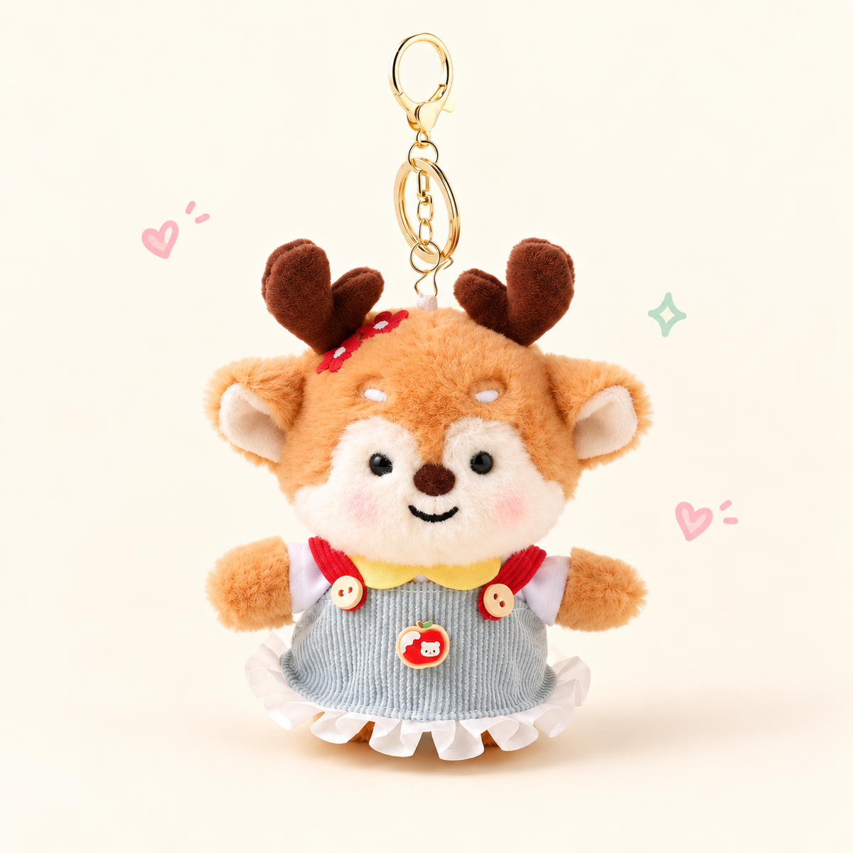 Apple Accent Dressed Deer Plush Bag Charm on a soft pastel background