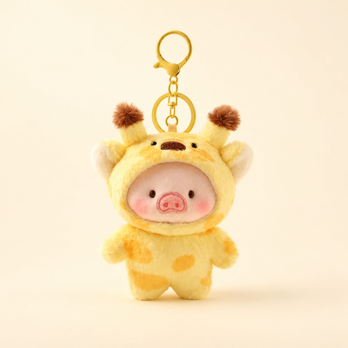 Pig plush bag charm wearing a yellow giraffe costume