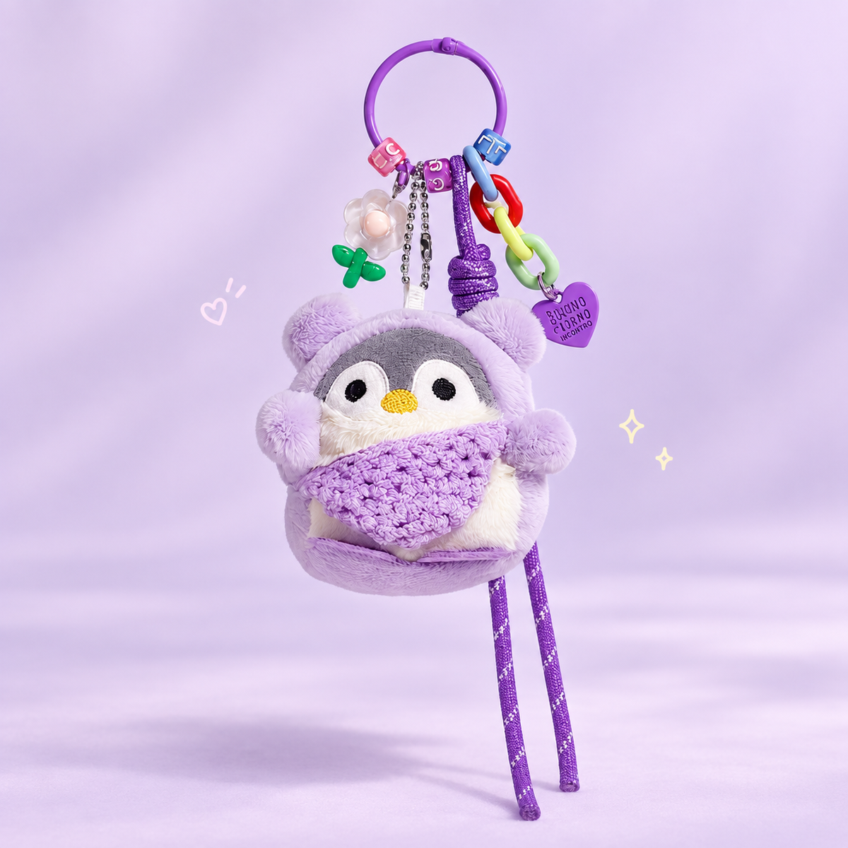 Cute Penguin Plush Keychain on a softly lit cream and pastel background.