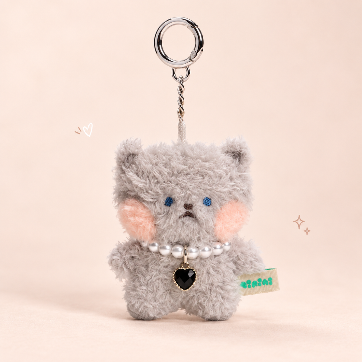 Forest Animals Plush Keychain on a softly lit cream and pastel background.