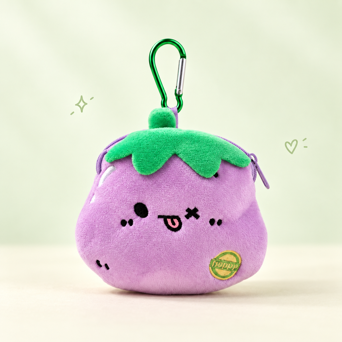 Happy Harvest Plush Coin Purse Charm on a soft pastel background