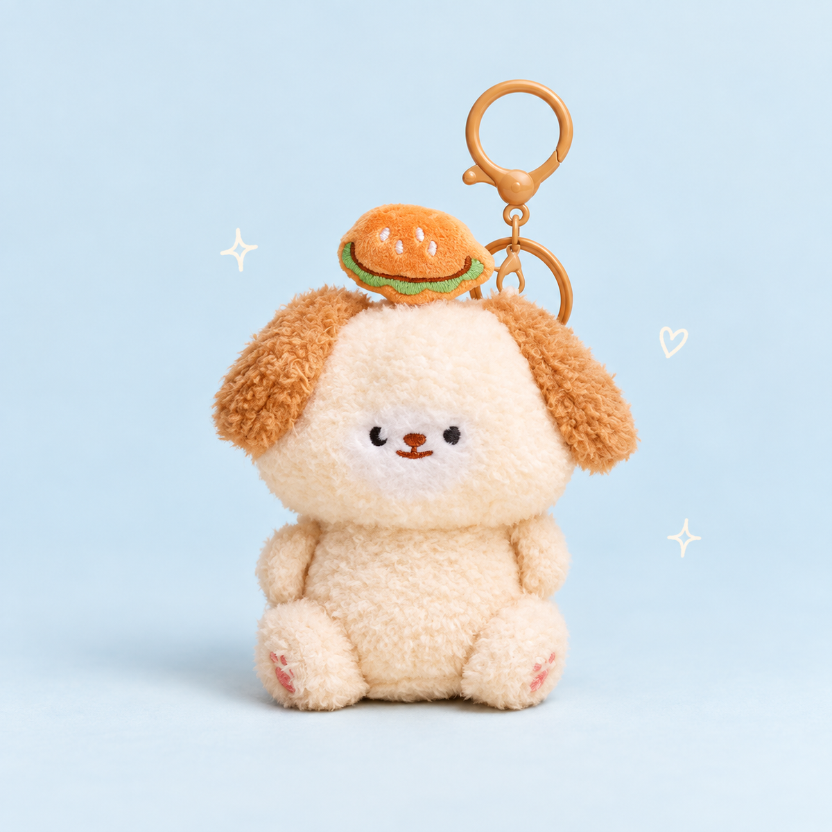 Puppy & Kitty Plush Charm on a softly lit cream and pastel background.