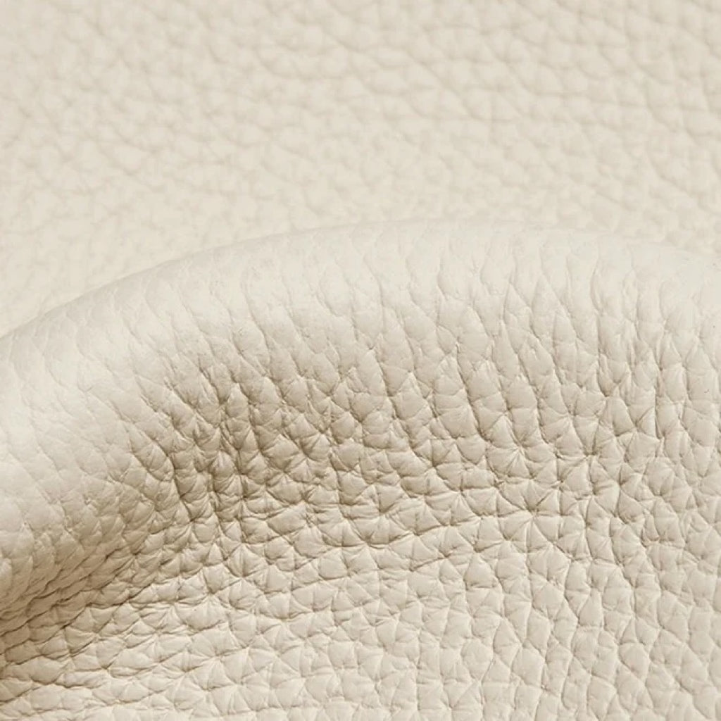 Close-up of the cream pebbled surface texture