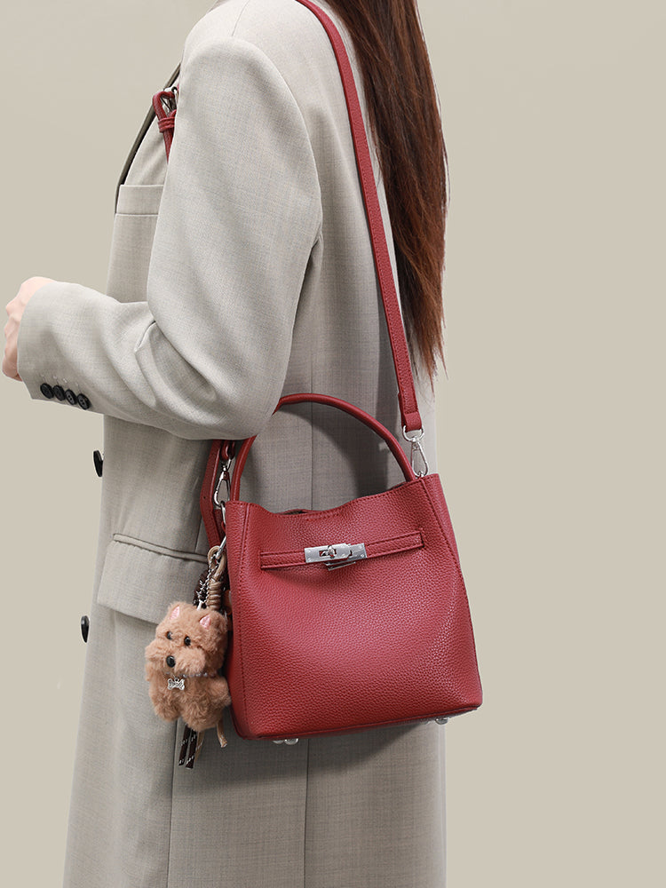 Wine red mini bucket bag worn on the shoulder