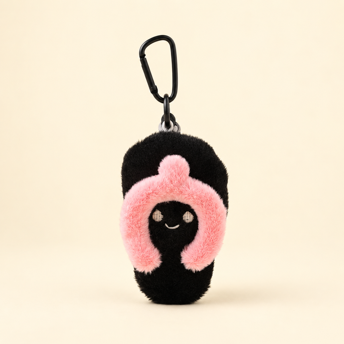 black miniature plush flip-flop bag charm on ivory background
