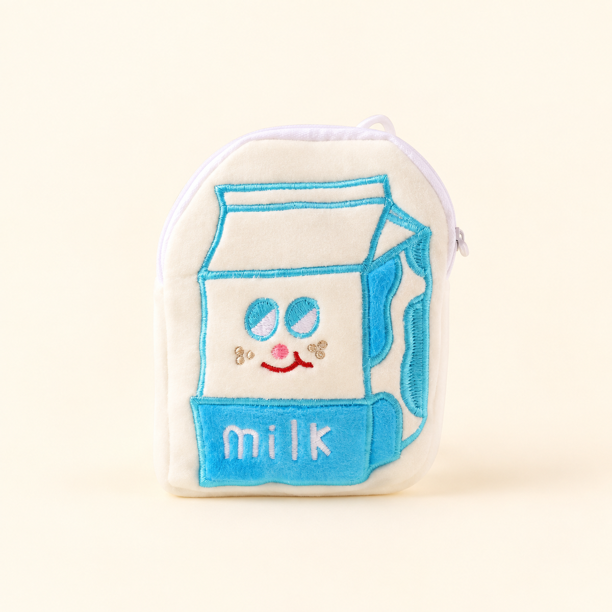 milk plush coin purse on ivory background