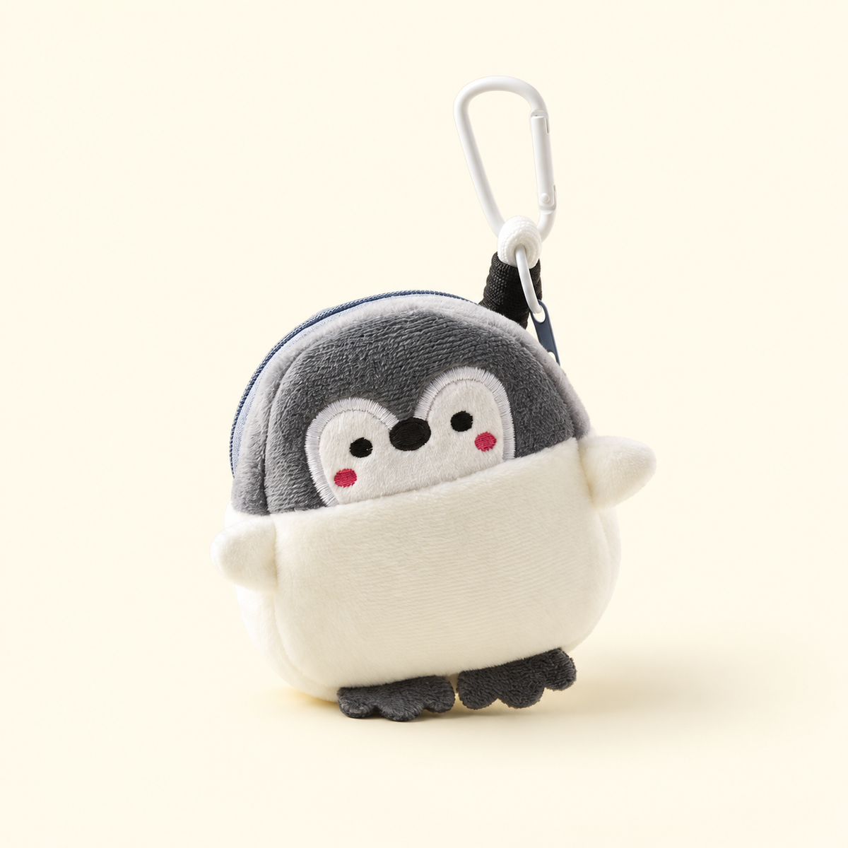 penguin plush coin purse charm on ivory background