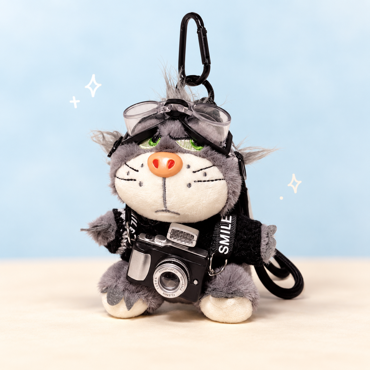 Cool Cat Plush Keychain on a softly lit cream and pastel background.