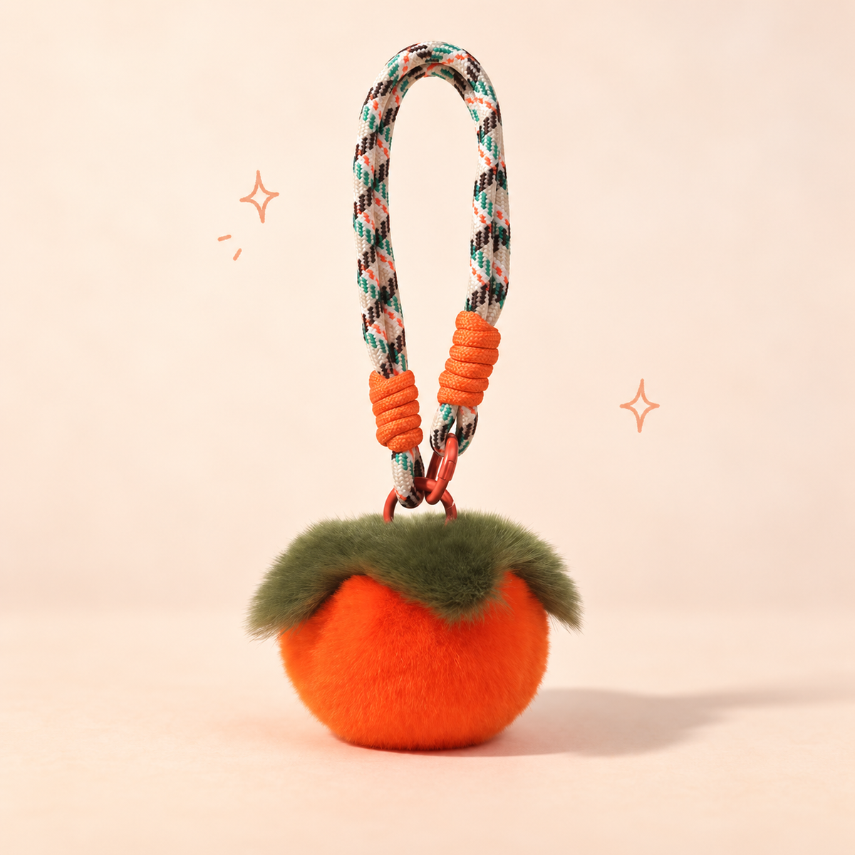 Persimmon Plush Charm on a softly lit cream and pastel background.